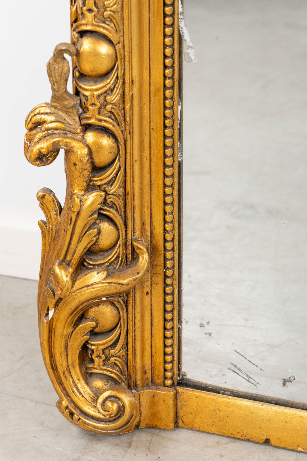A mirror, sculptured wood, and stucco in a Louis XV style. 20th C. (W:110 x H:218 cm) - Image 4 of 13