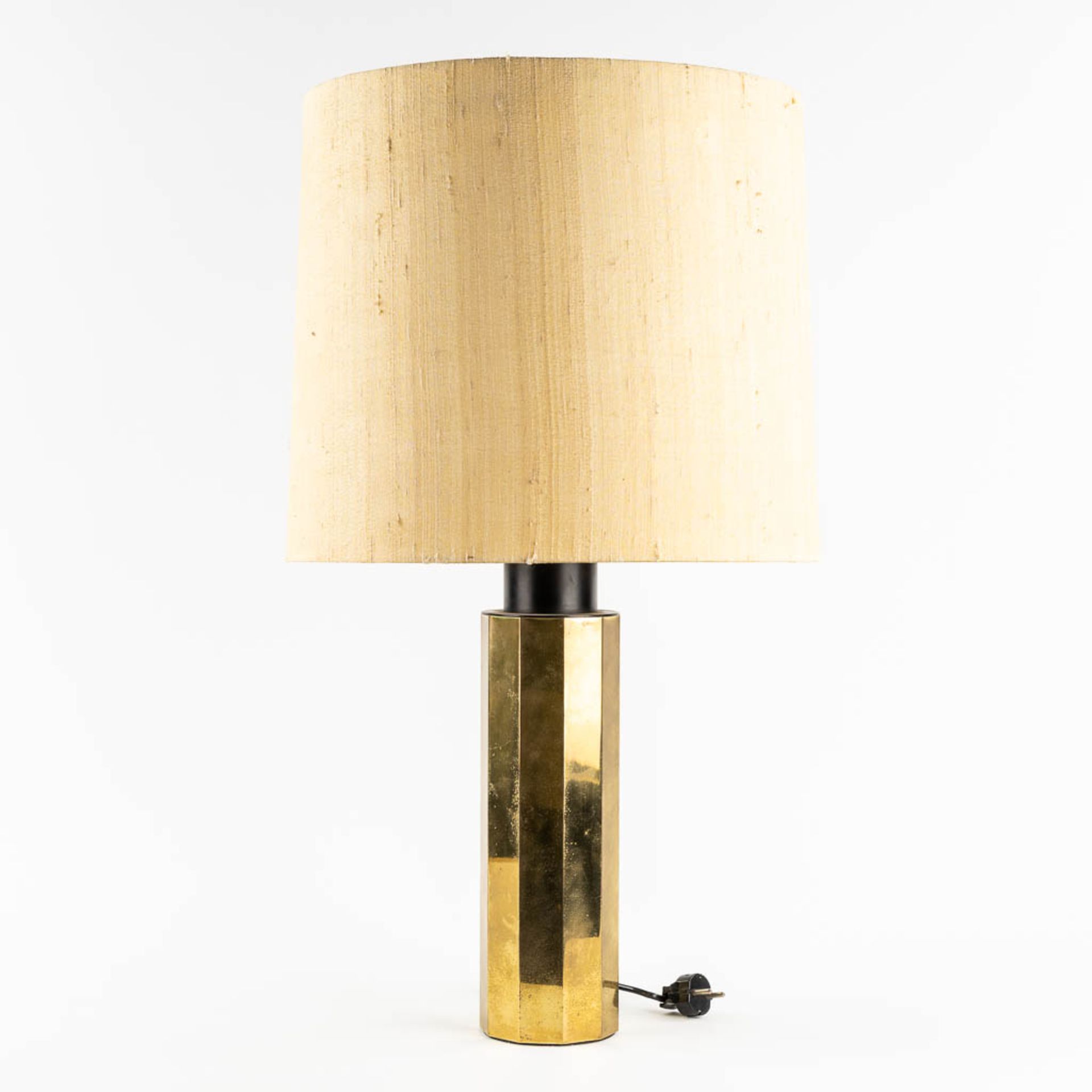 A mid-century table lamp, gilt brass. Scandinavia, circa 1960.