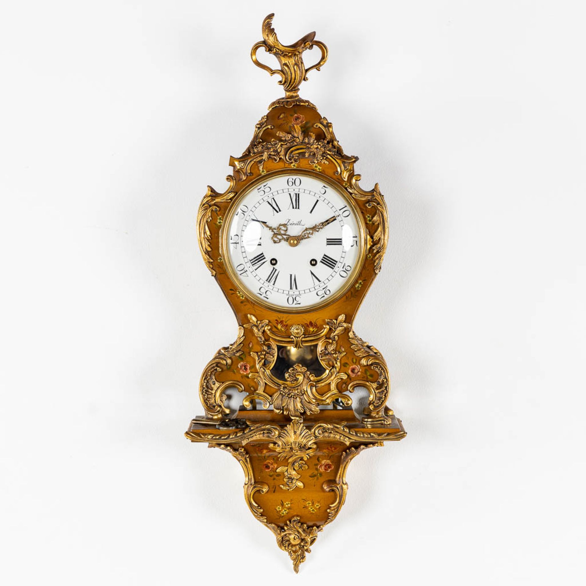 Zenith, a cartel clock. Wood with a hand-painted decor, gilt bronze mounted in louis XV style. (W:27