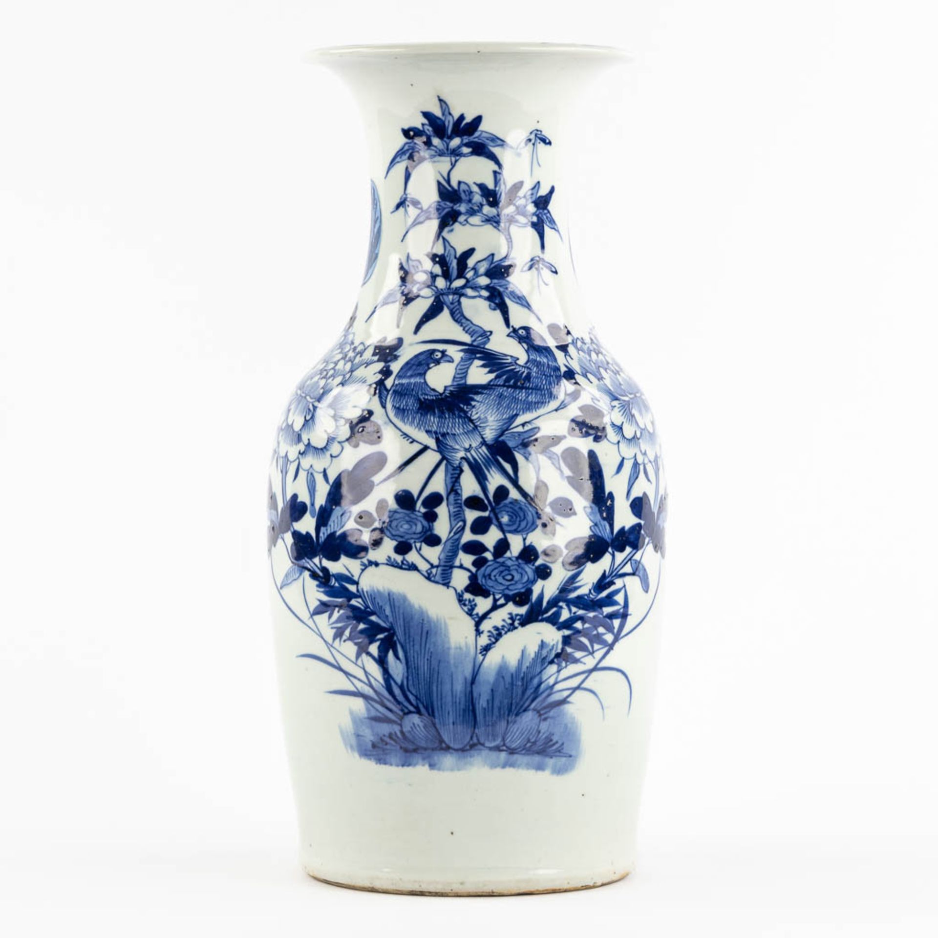 A Chinese vase with blue-white decor of birds and flowers. (H:43 x D:20 cm)