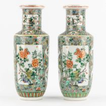 A pair of Chinese Famille Verte vases, decorated with flowers and symbols of happiness. 19th/20th C.