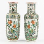 A pair of Chinese Famille Verte vases, decorated with flowers and symbols of happiness. 19th/20th C.
