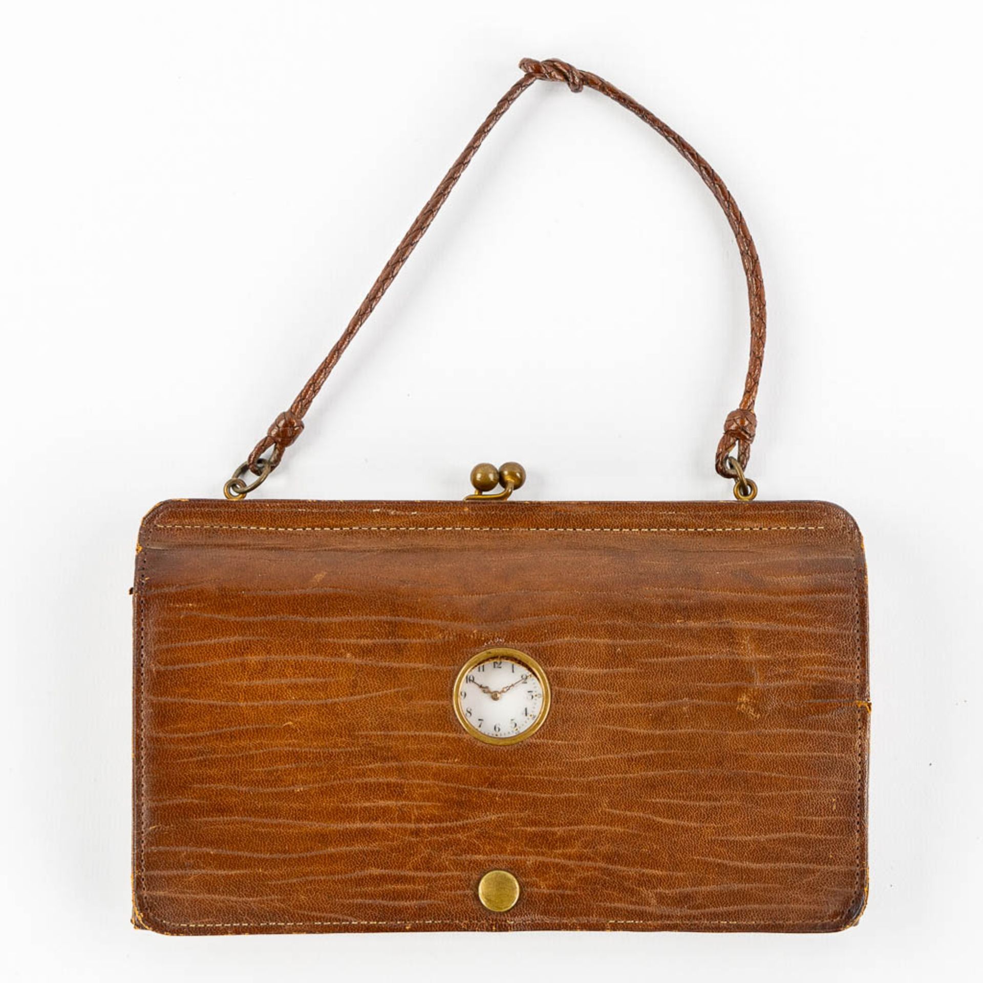 An antique purse, leather mounted with a pocket watch. Brussels, Circa 1920. (W:19 x H:12 cm)