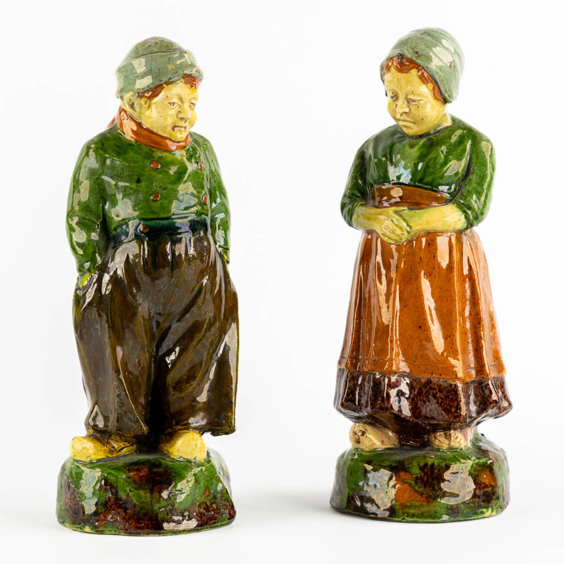 Figurine of a Man and Woman, Flemish Earthenware, possibly Caessens. Circa 1900. (H:32 x D:12 cm)