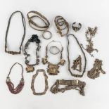 A collection of belts, bracelets and necklaces, silver of Islamic origin. 19th/20th C. 2,865kg.