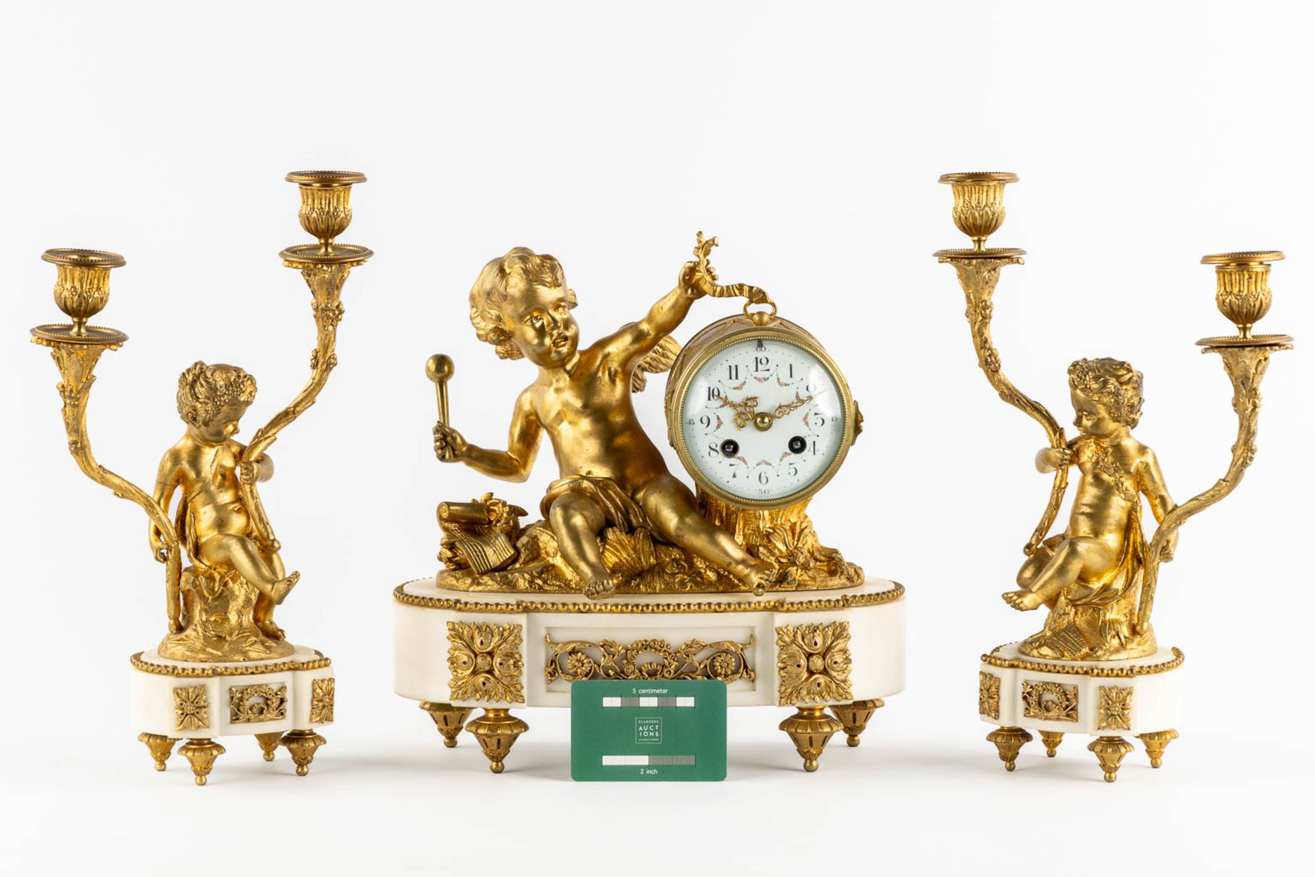 A three-piece mantle garniture, gilt bronze and Carrara marble. 19th C. (L:21 x W:28 x H:30 cm) - Image 2 of 12