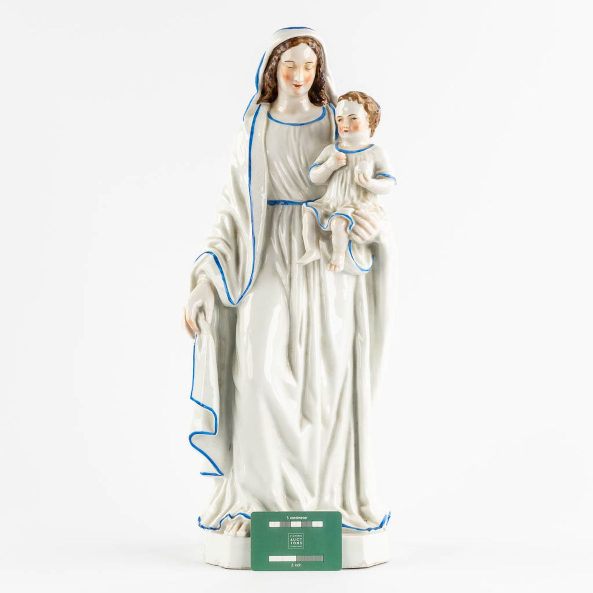 A large figurine of 'Madonna with a child' polychrome porcelain. 19th C. (L:17 x W:21 x H:52 cm) - Image 2 of 11