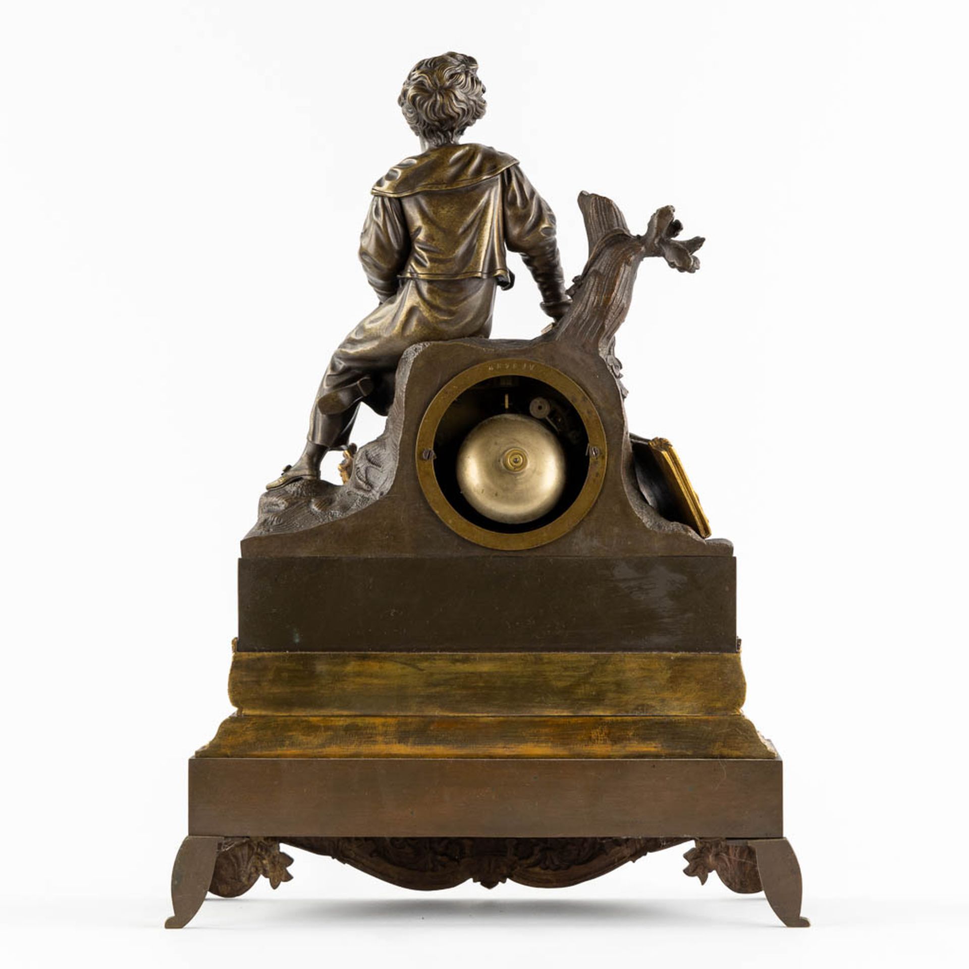 A mantle clock, gilt and patinated bronze, Empire style. 19th C. (L:13 x W:34 x H:46 cm) - Image 5 of 9