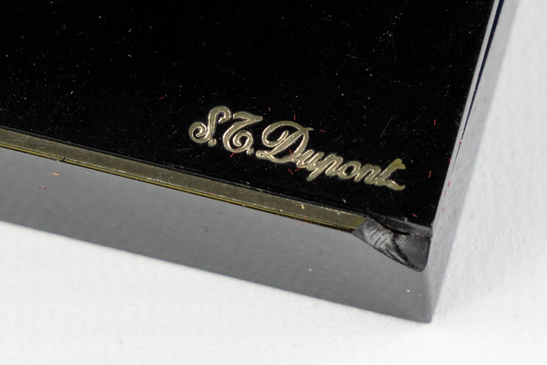 ST. Dupont, Three gold and silver plated lighters, added a Givency lighter. (L:1 x W:3,5 x H:6 cm) - Image 4 of 14