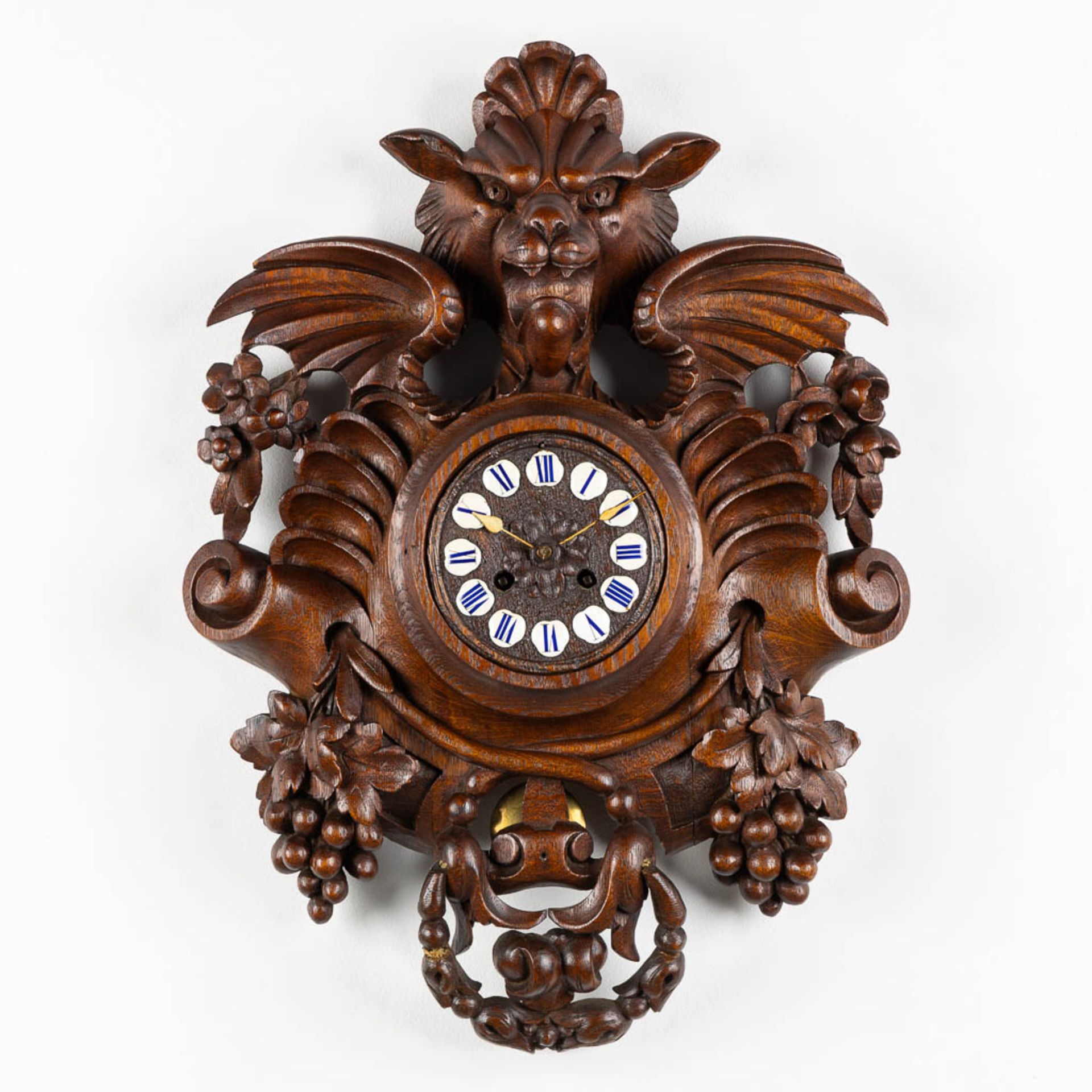 An antique Swiss or Black-Forest, wall-mounted clock. Circa 1880. (W:38 x H:53 cm)