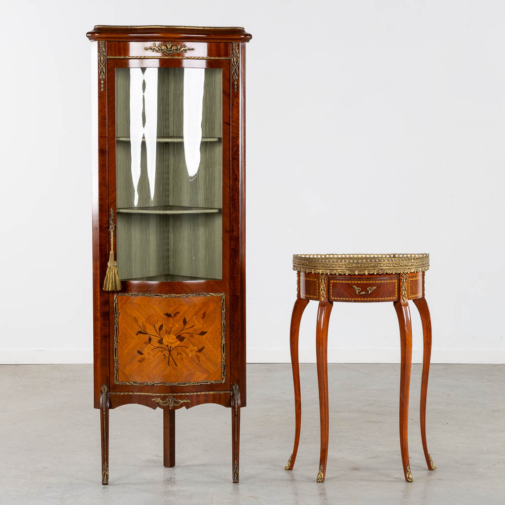 A corner cabinet and console table, marquetry mounted with bronze. 20th C. (L:34 x W:54 x H:150 cm)