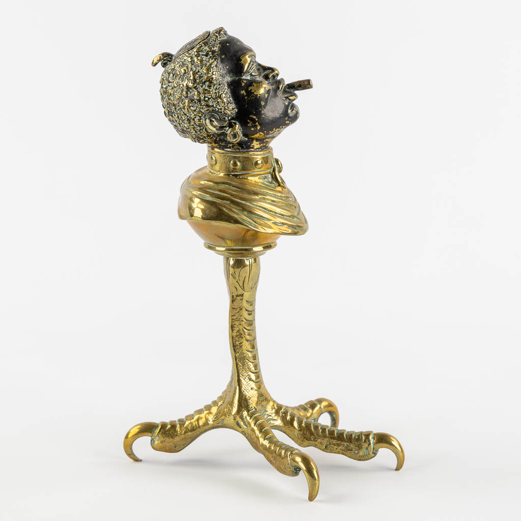 An antique Cigarette or Cigar lighter, polished bronze in the shape of a Blackamoor. 19th/20th C. (L - Image 6 of 11