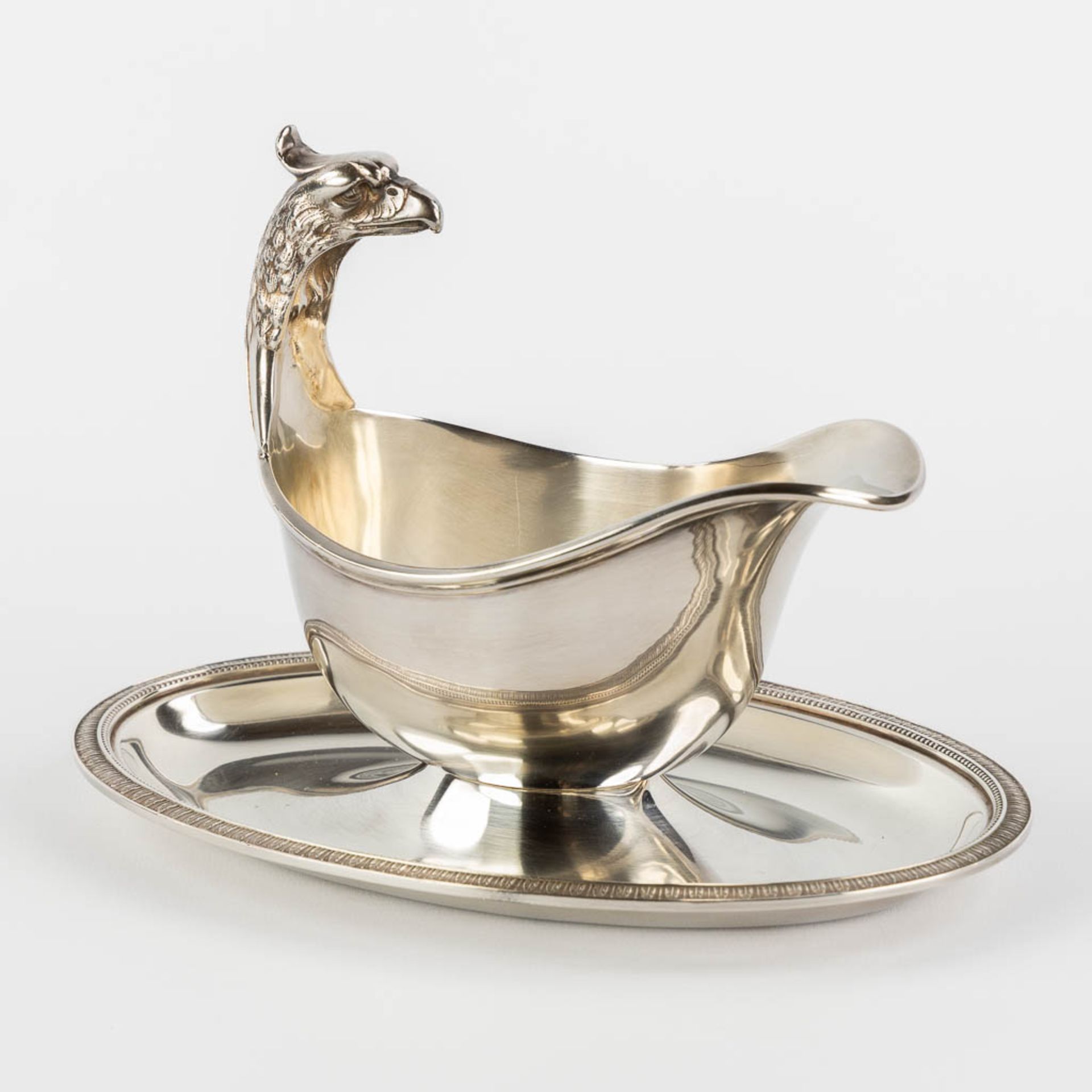 Christofle France 'Malmaison', a saucer with an eagle head. Silver-plated metal. (L:14 x W:22,5 x H: