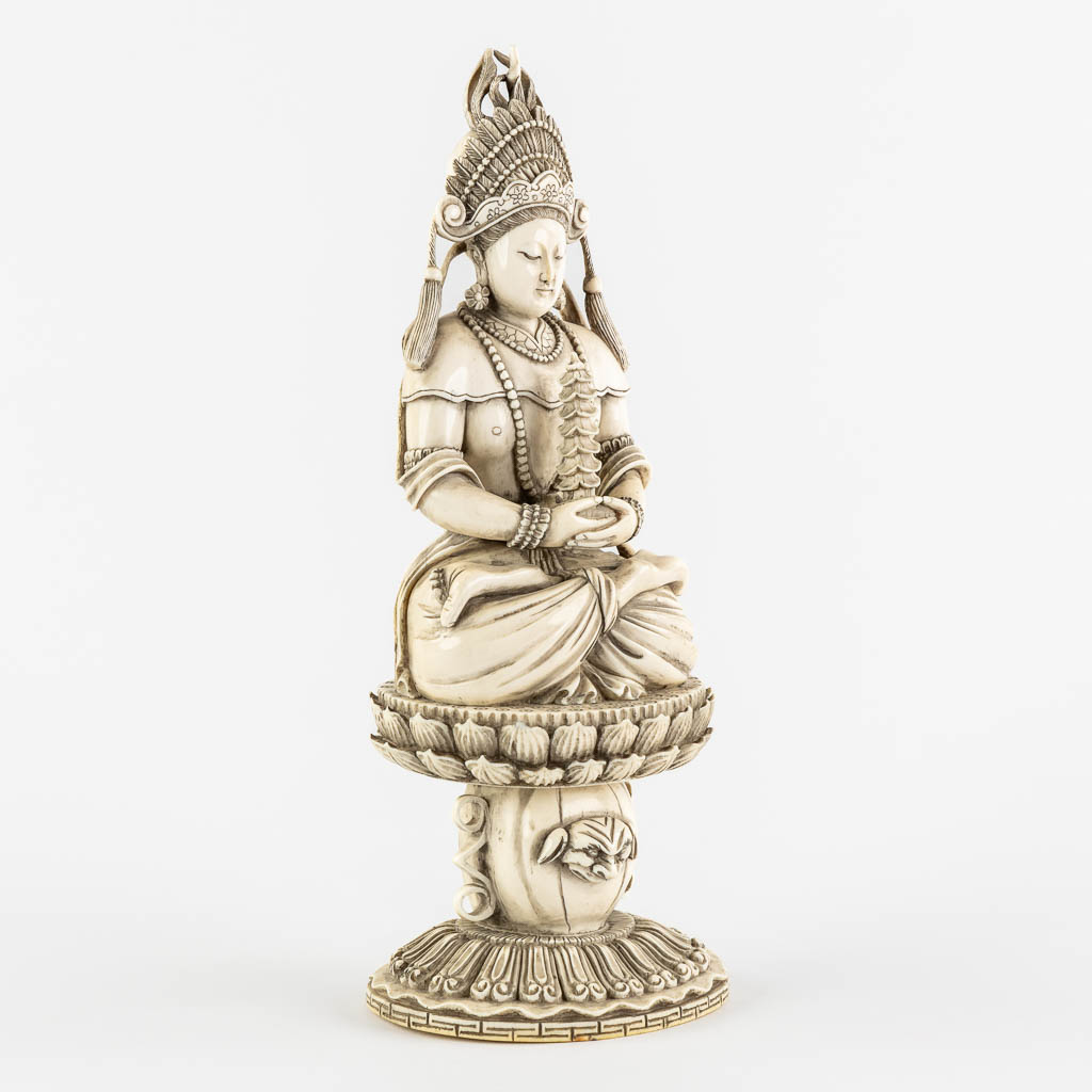 A Chinese Buddha holding a Pagoda, sculptured ivory. Circa 1900. (L:10 x W:12 x H:31 cm) - Image 3 of 11