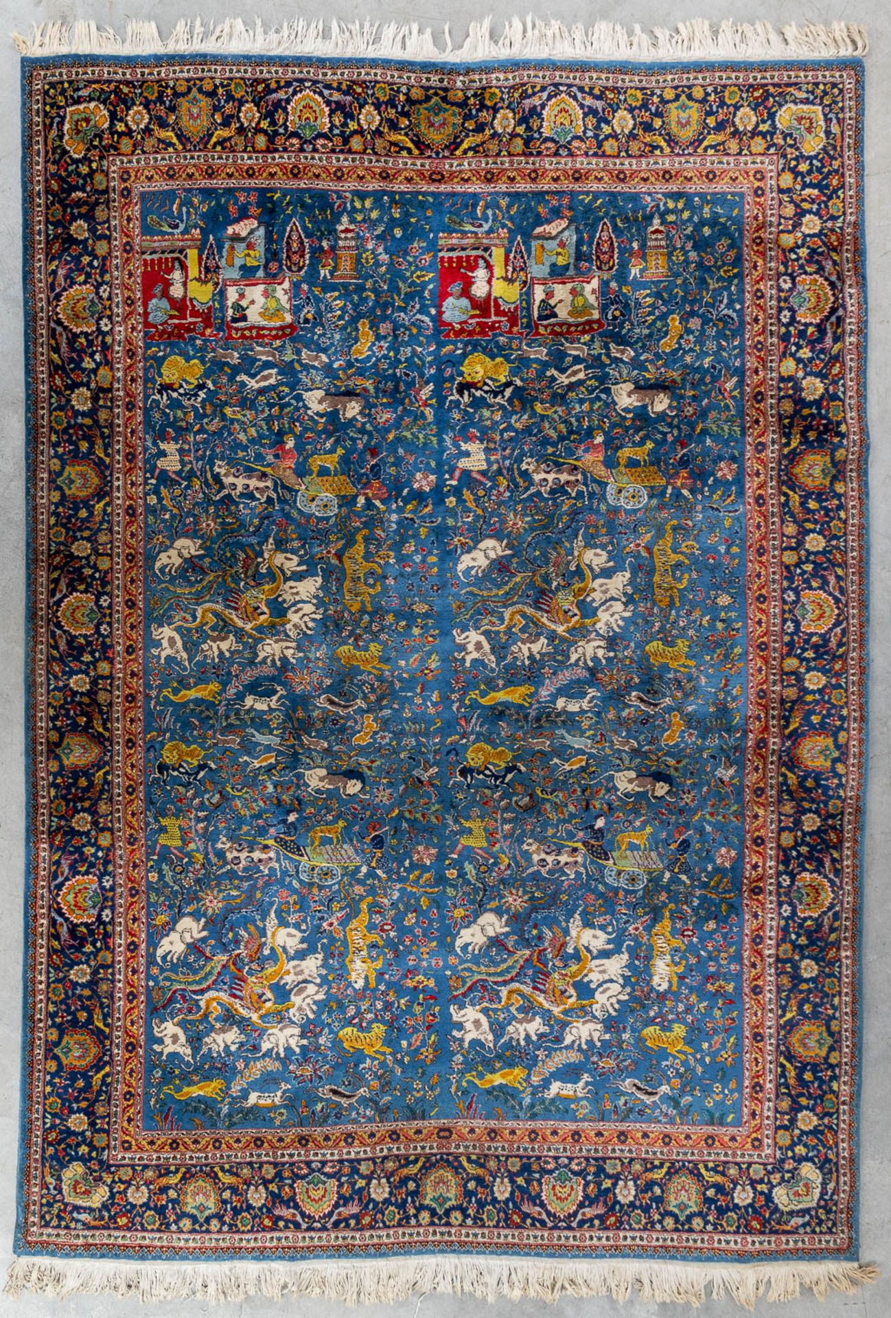 An Oriental hand-made carpet with figurative decor, Tabriz. (L:340 x W:243 cm)