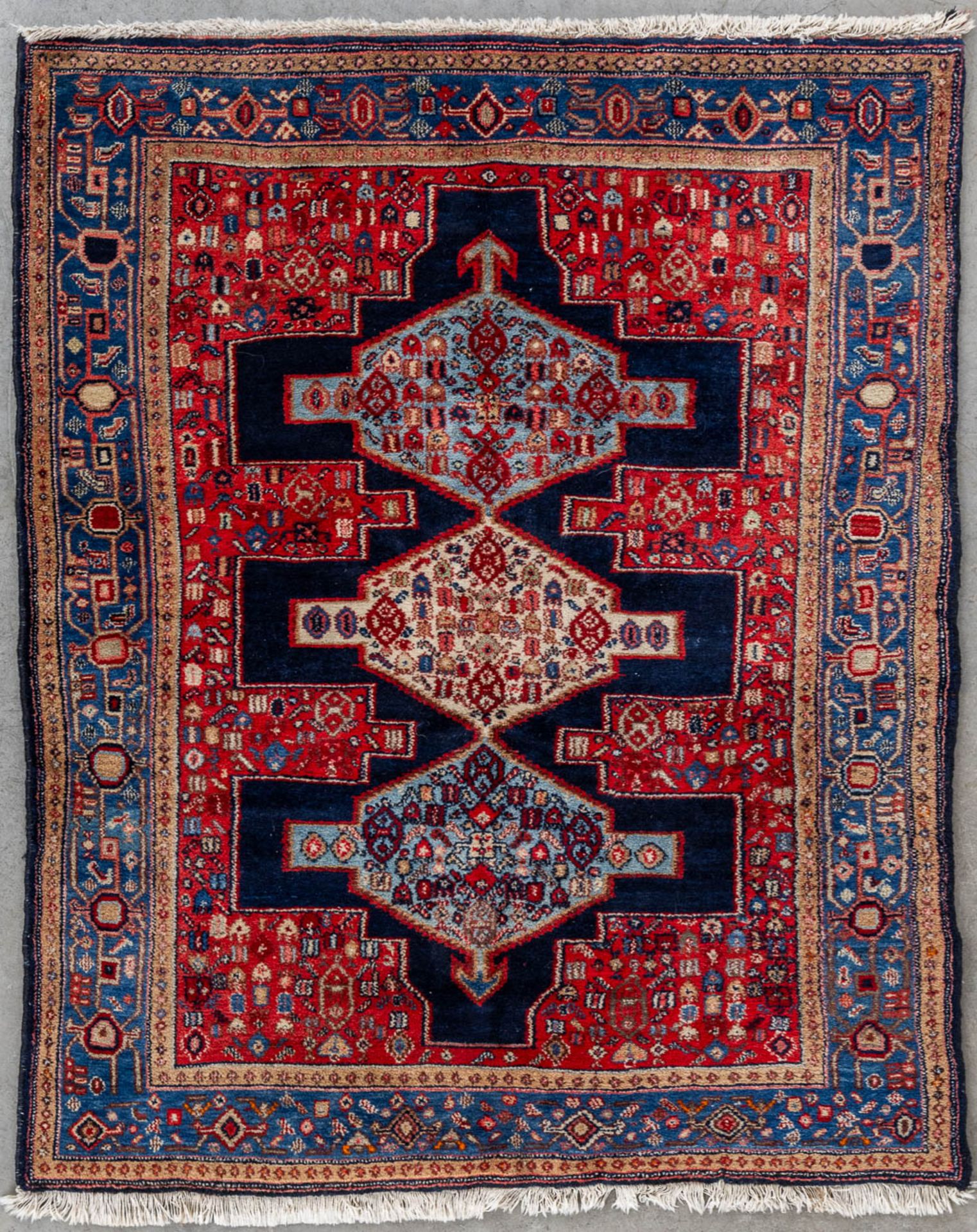 An Oriental hand-made carpet, Senneh, Iran. (L:157 x W:126 cm)