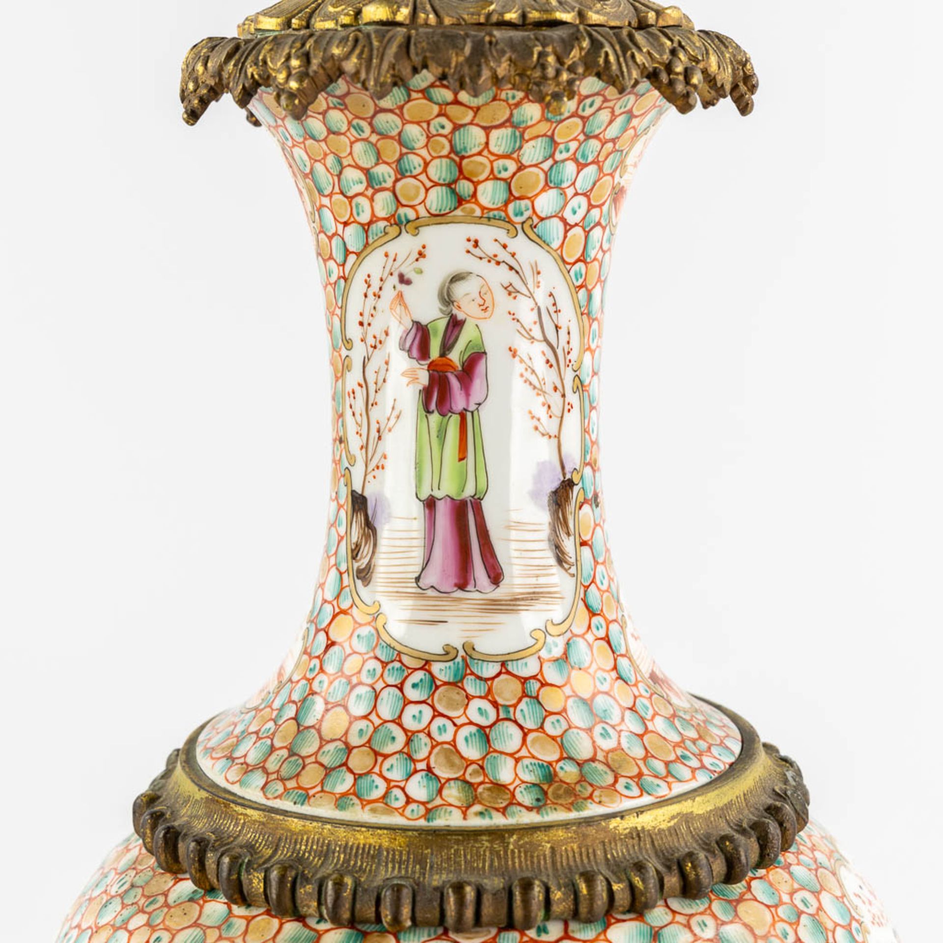 An antique oil lamp, Chinese Famille Rose porcelain mounted with gilt bronze. 19th C. (L:20 x W:20 x - Image 8 of 12