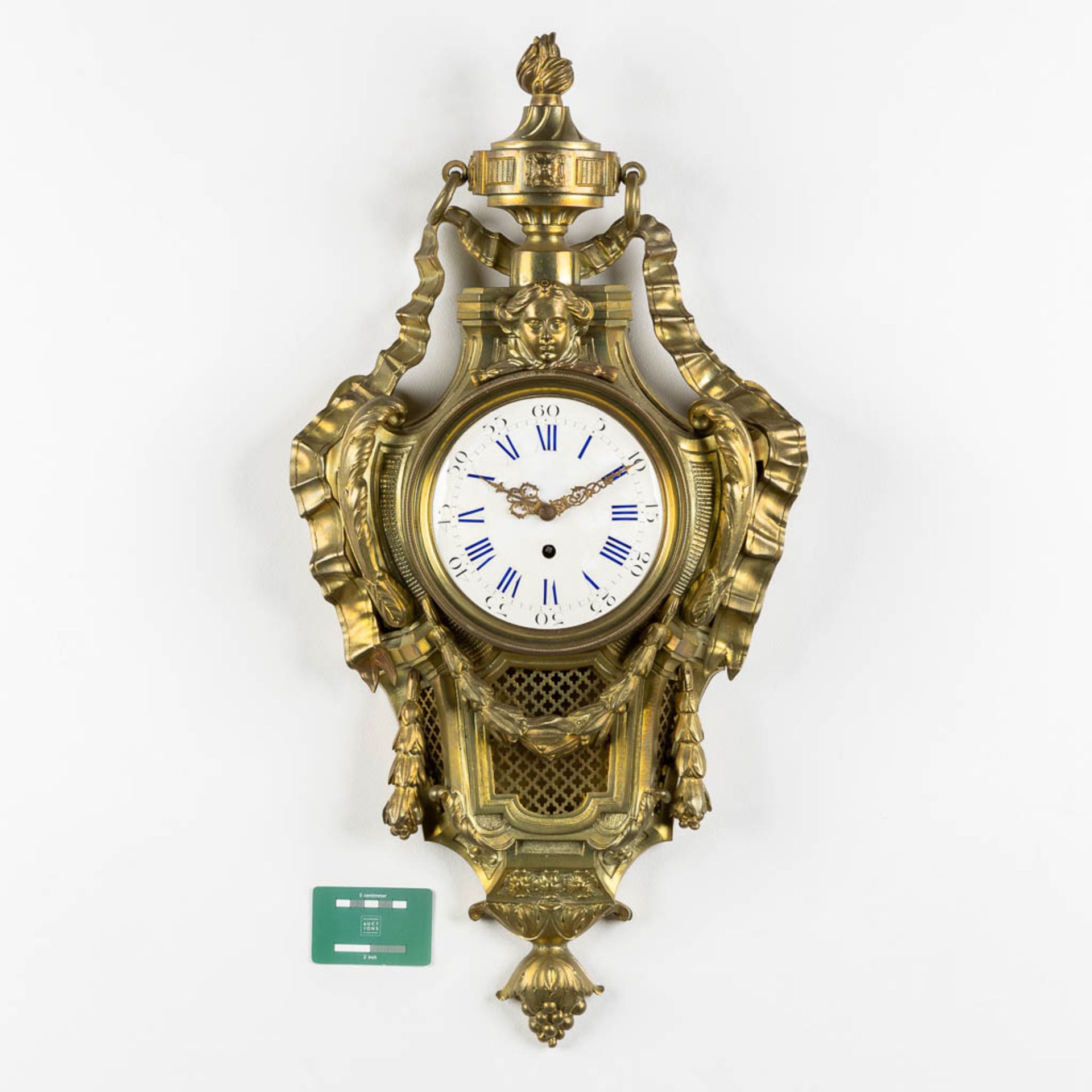 A wall-mounted bronze cartel clock, Louis XVI style. 19th C. (L:12 x W:37 x H:71 cm) - Image 2 of 7