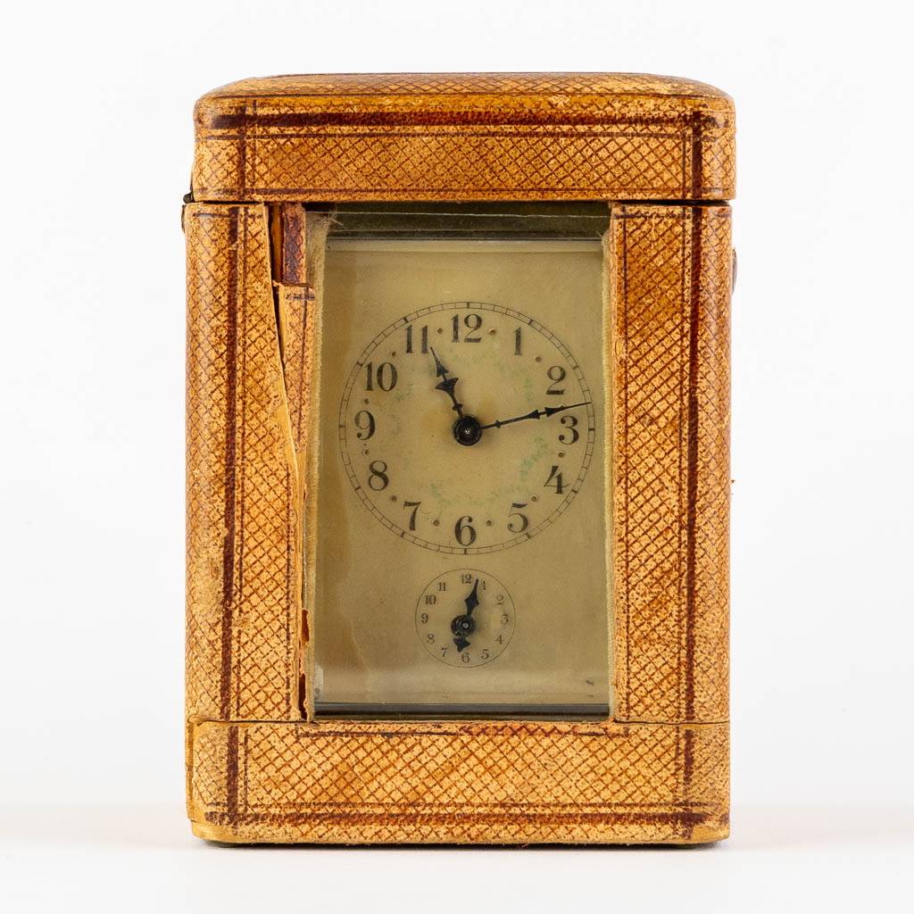 An officer's clock, brass and glass in the original travel case. (L:6,5 x W:8 x H:15 cm) - Image 4 of 12