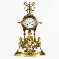 A mantle clock, polished bronze, decorated with Mythological Figures. Circa 1880. (L:15 x W:26 x H:4