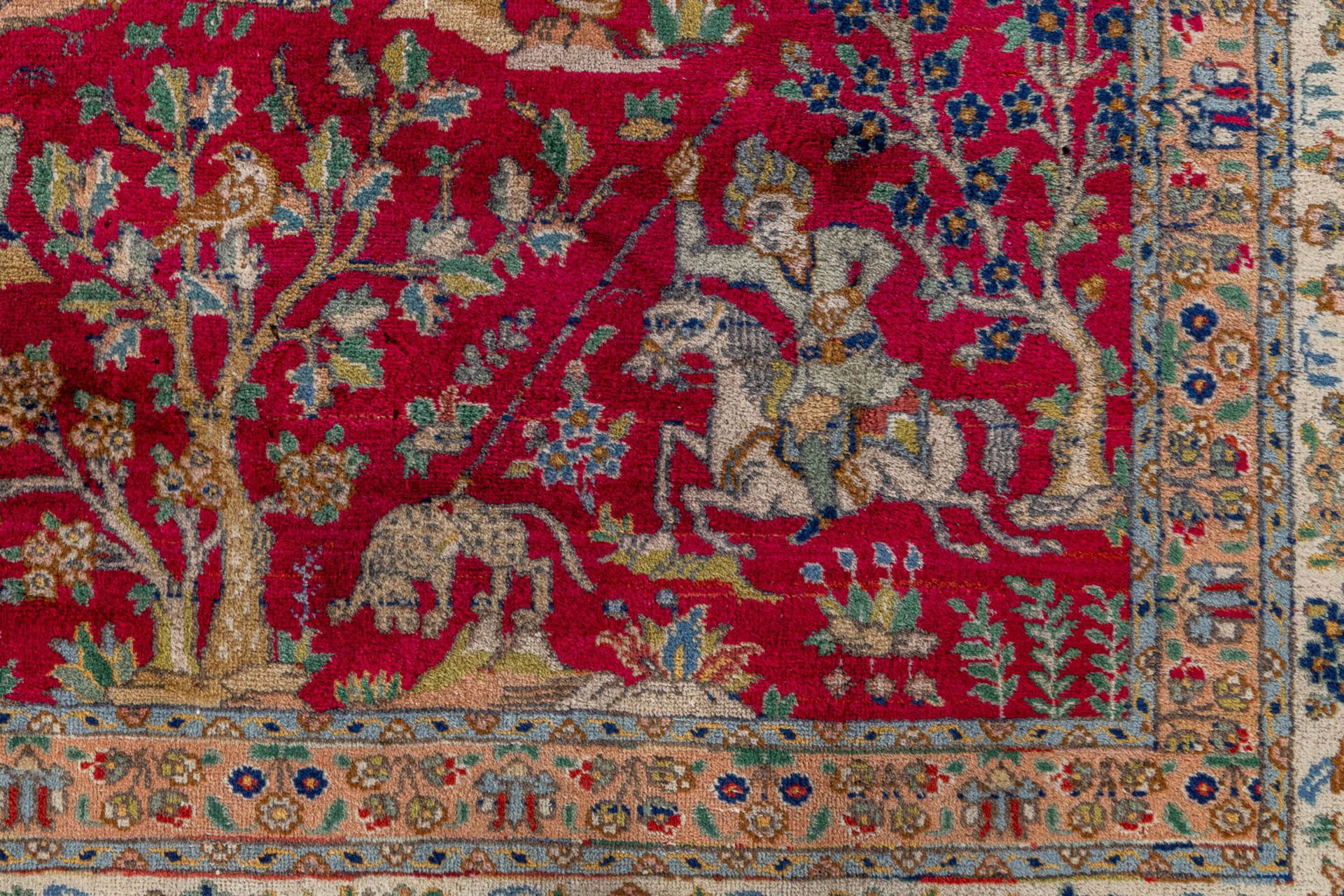 A large Oriental hand made carpet, hunting scènes, Tabriz. (L:329 x W:252 cm) - Image 7 of 16