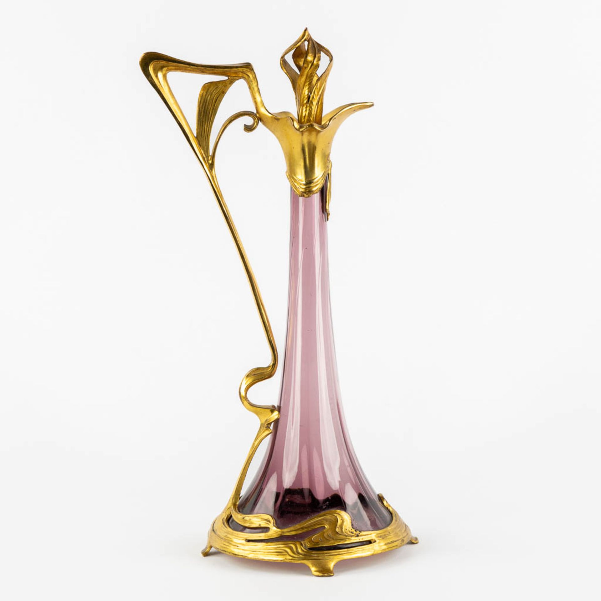 A pitcher, gilt metal and purple glass, Art Nouveau. (L:16 x W:20 x H:39 cm) - Image 3 of 11