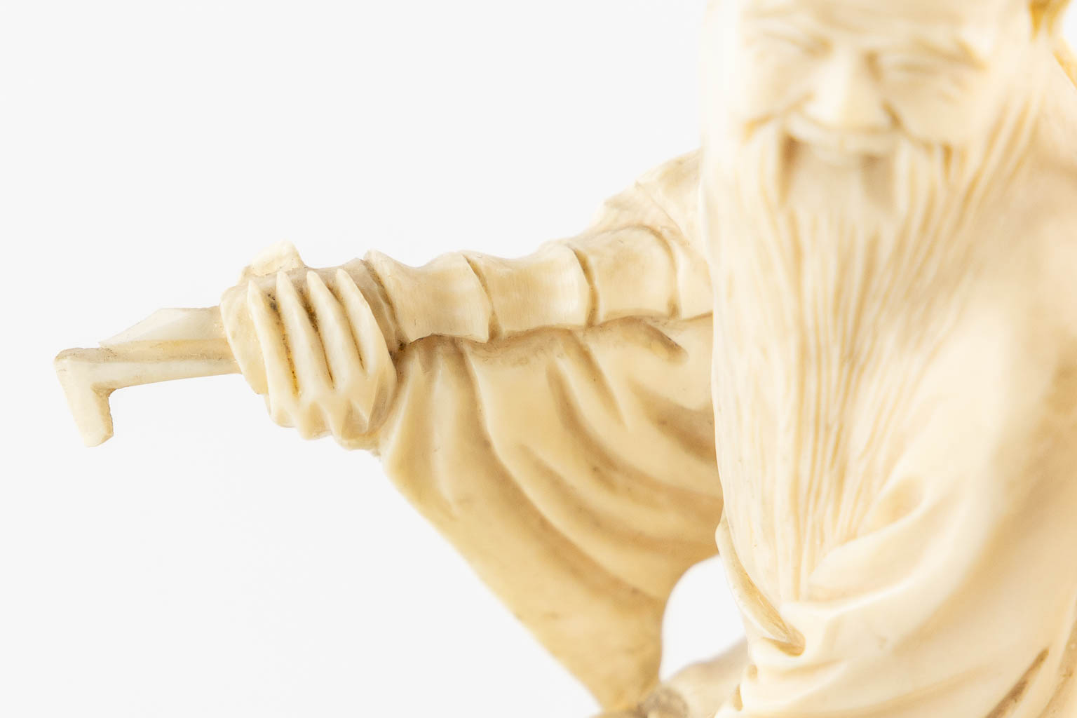 A Chinese sculptured figurine of Zhang Guolao, one of the eight immortals, ivory. (L:6 x W:12 x H:20 - Image 10 of 10