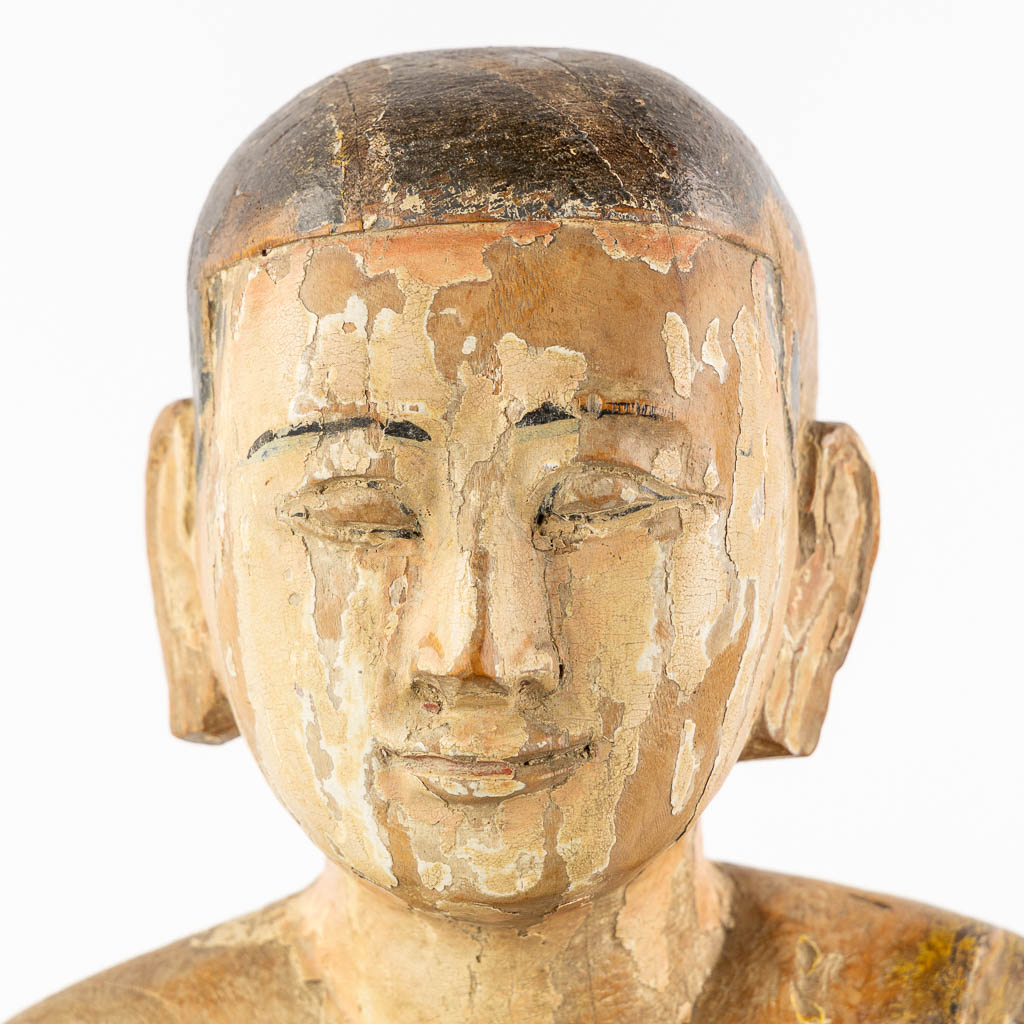 An antique wood-sculptured figurine of a monk. 18th/19th C. (L:36 x W:30 x H:47 cm) - Image 8 of 10