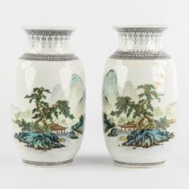 A pair of Chinese vases with a mountain landscape, 20th C. (H:24 x D:14 cm)