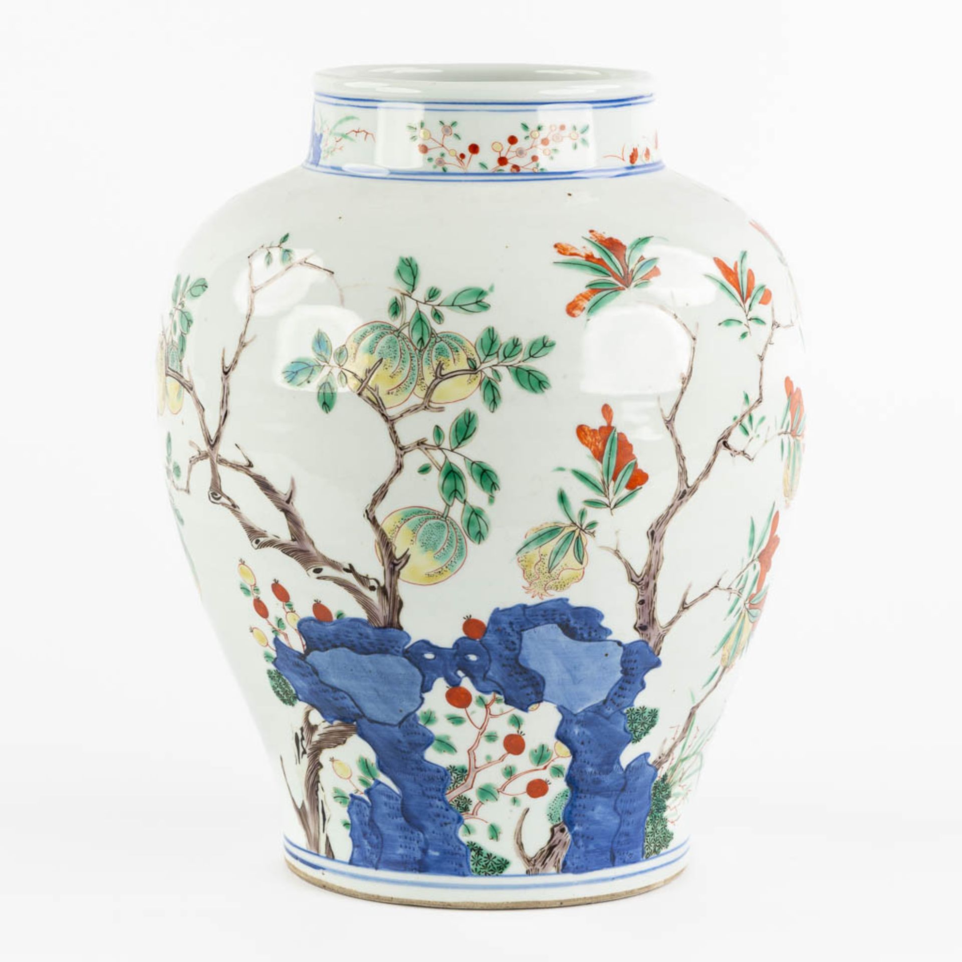 A Chinese pot, Wuchai decorated with growing fruits and blossoms. (H:31 x D:25 cm)