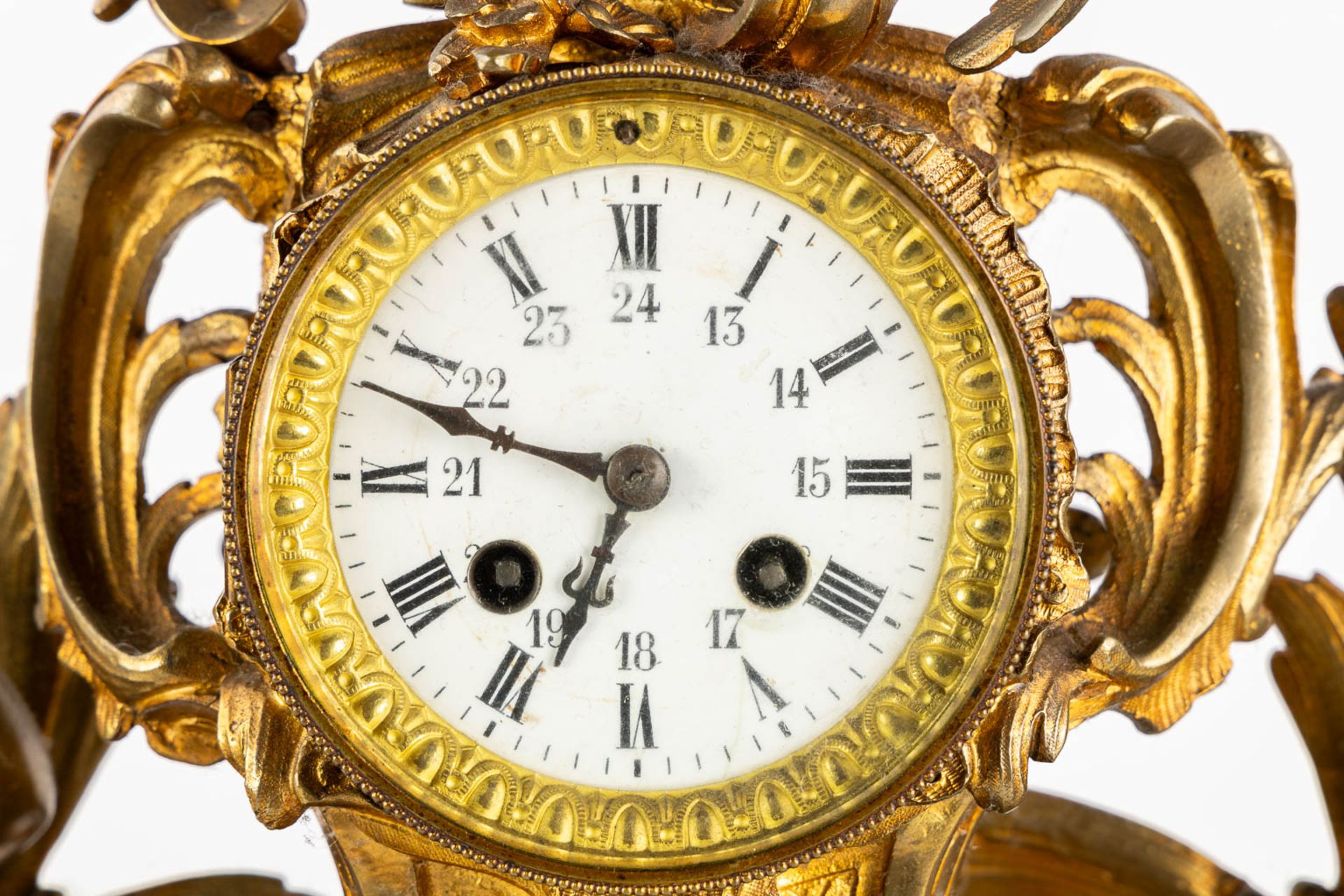 A three-piece mantle garniture clock and candelabra, gilt bronze. 19th C. (L:21 x W:55 x H:48 cm) - Image 13 of 16