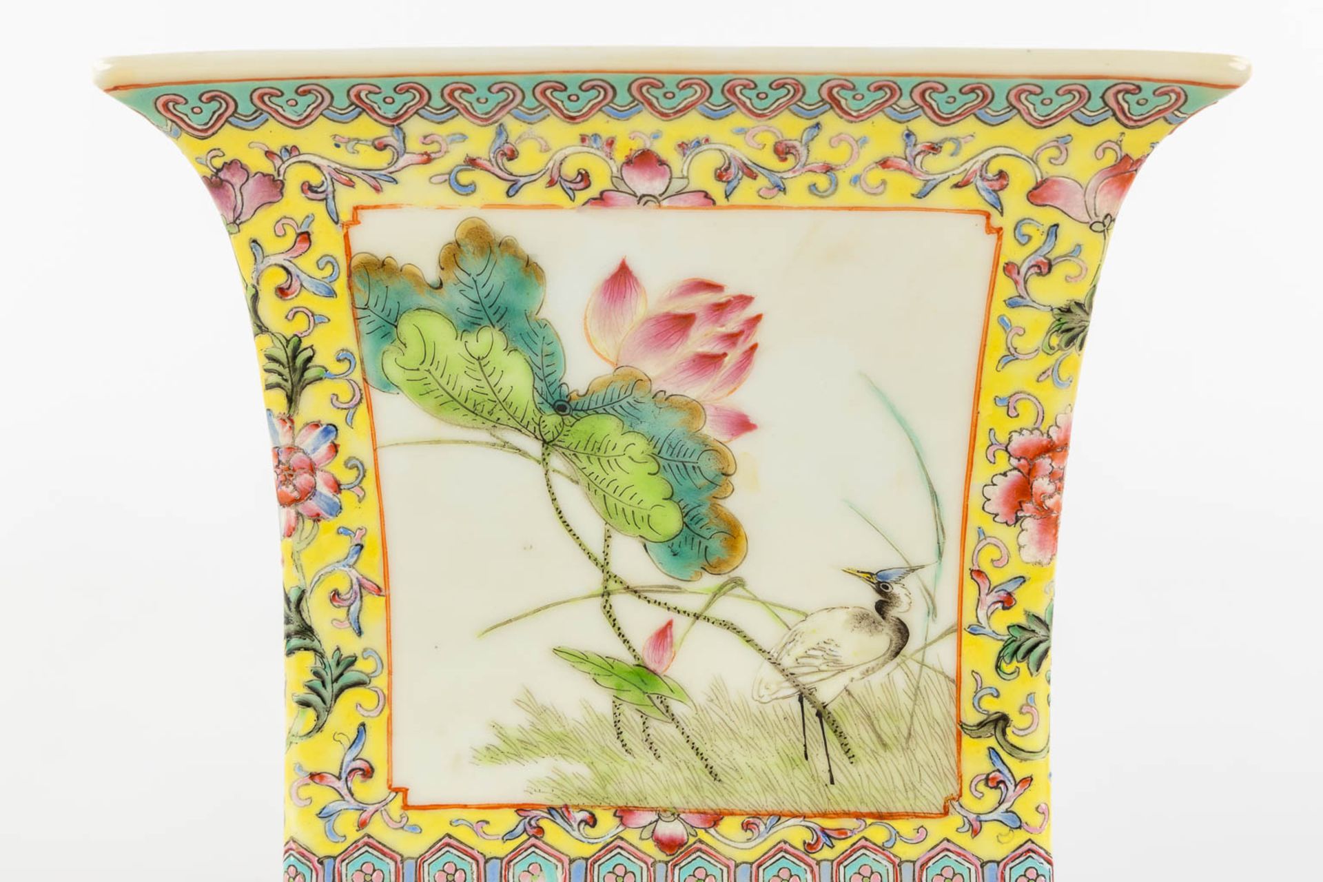A Chinese Cache Pot, Famille Rose decorated with fauna and flora. (L:18 x W:18 x H:17,5 cm) - Image 12 of 13
