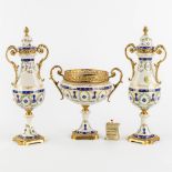 A.C.F. a three-piece mantle garniture, glazed ceramics mounted with bronze. (H:41 cm)