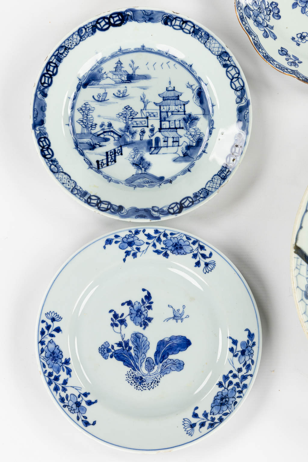 Eleven plates, Blue-White and Famille Rose, 18th and 19th C. (D:36,5 cm) - Image 5 of 9