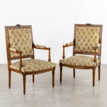 A pair of wood-sculptured armchairs with emboidered upholstry. Louis XVI style. (L:62 x W:64 x H:100