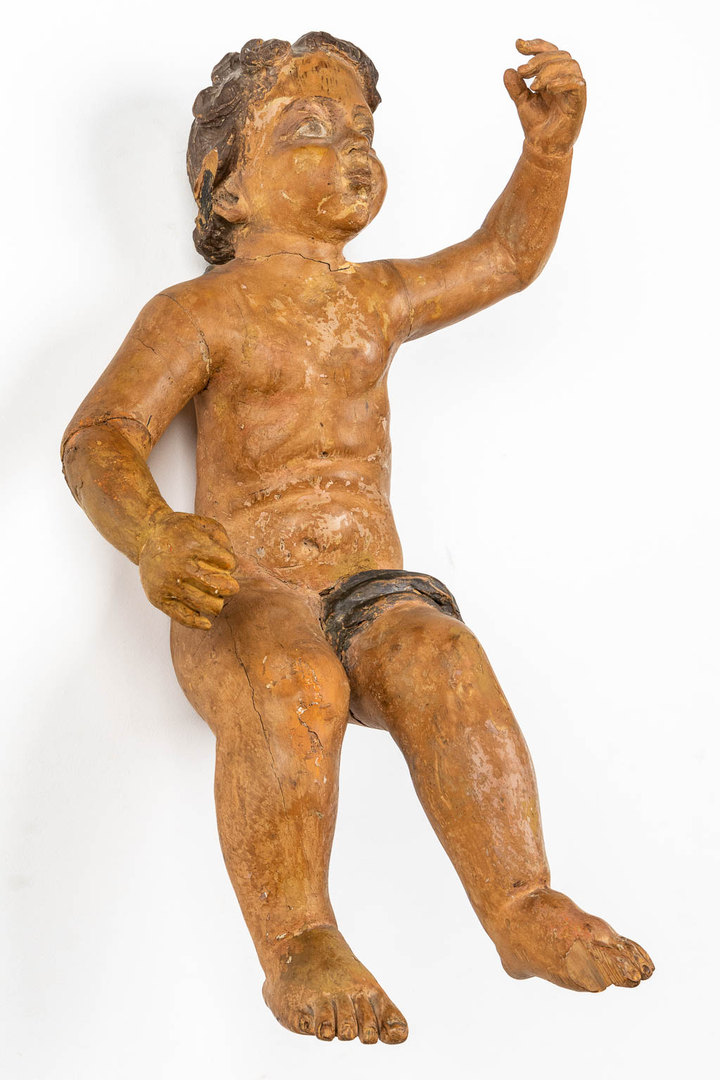 An antique figurine of a putto, sculptured and patinated wood. 18th C. (L:35 x W:34 x H:67 cm) - Image 4 of 12