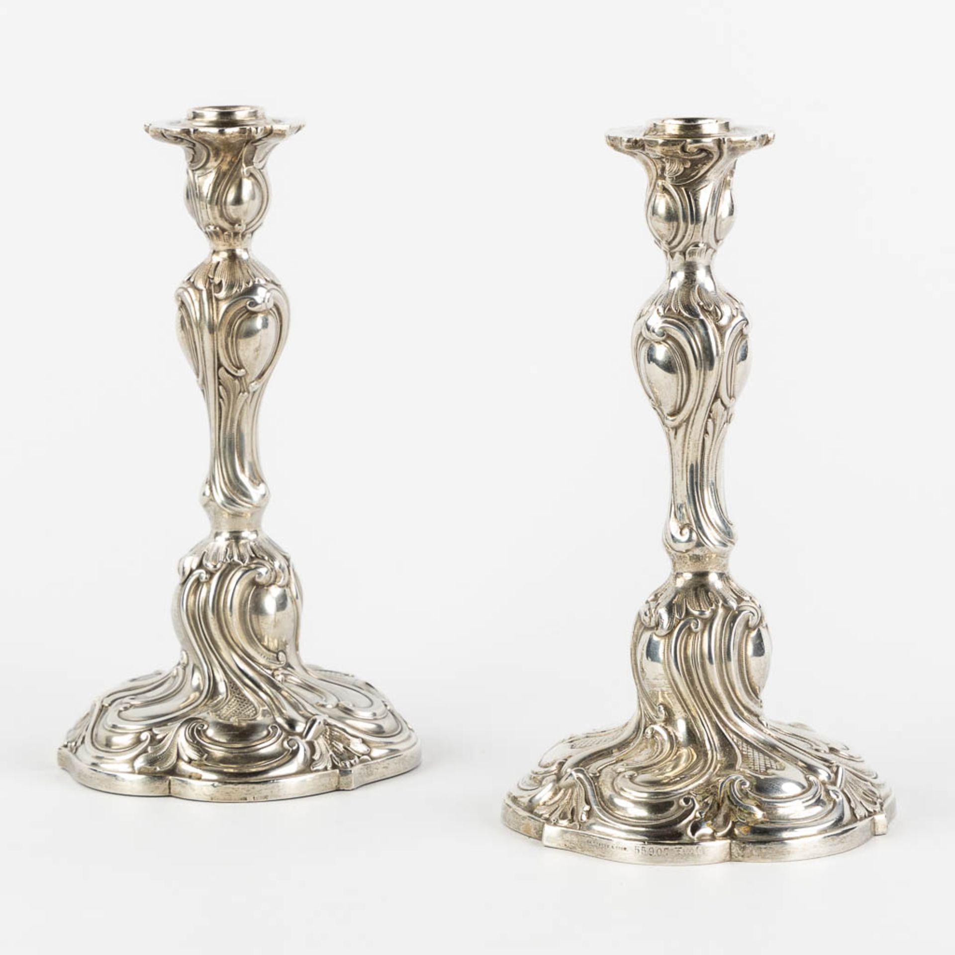 Th. Strube &amp; Sohn, a pair of candlesticks, silver in Louis XV style. Germany. 800/1000. (H:22 x