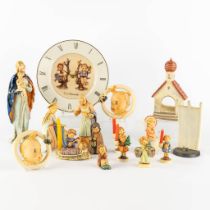 Hummel and Goebel, a collection of 15 pieces of polychrome porcelain. (D:27 cm)