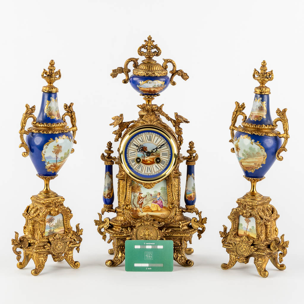 A three-piece mantle garniture clock and side pieces, bronze mounted with porcelain. (L:12 x W:20 x - Image 2 of 18