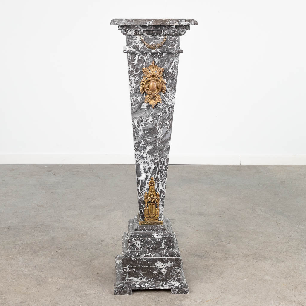 A pedestal, made of grey marble mounted with gilt bronze. (L:30 x W:30 x H:104 cm)