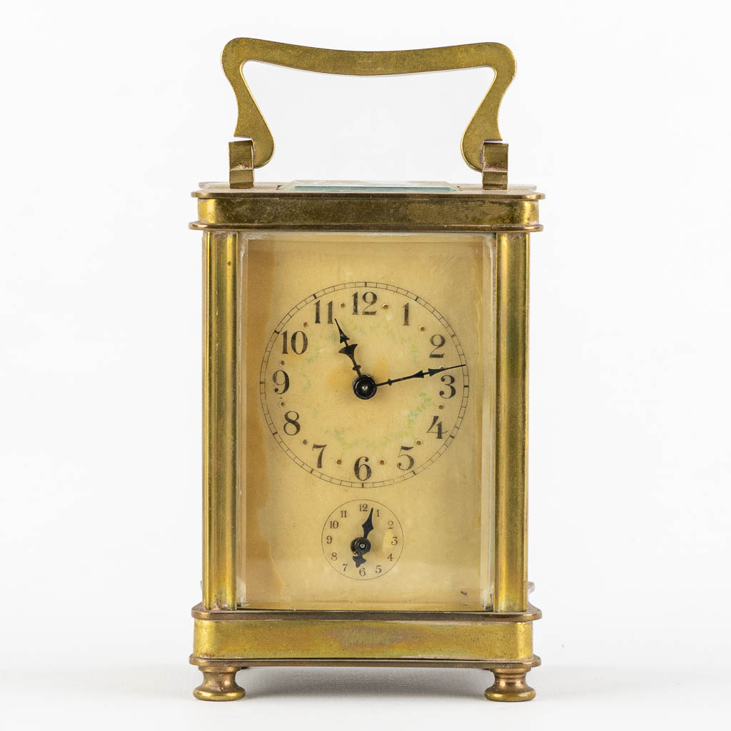 An officer's clock, brass and glass in the original travel case. (L:6,5 x W:8 x H:15 cm) - Image 8 of 12