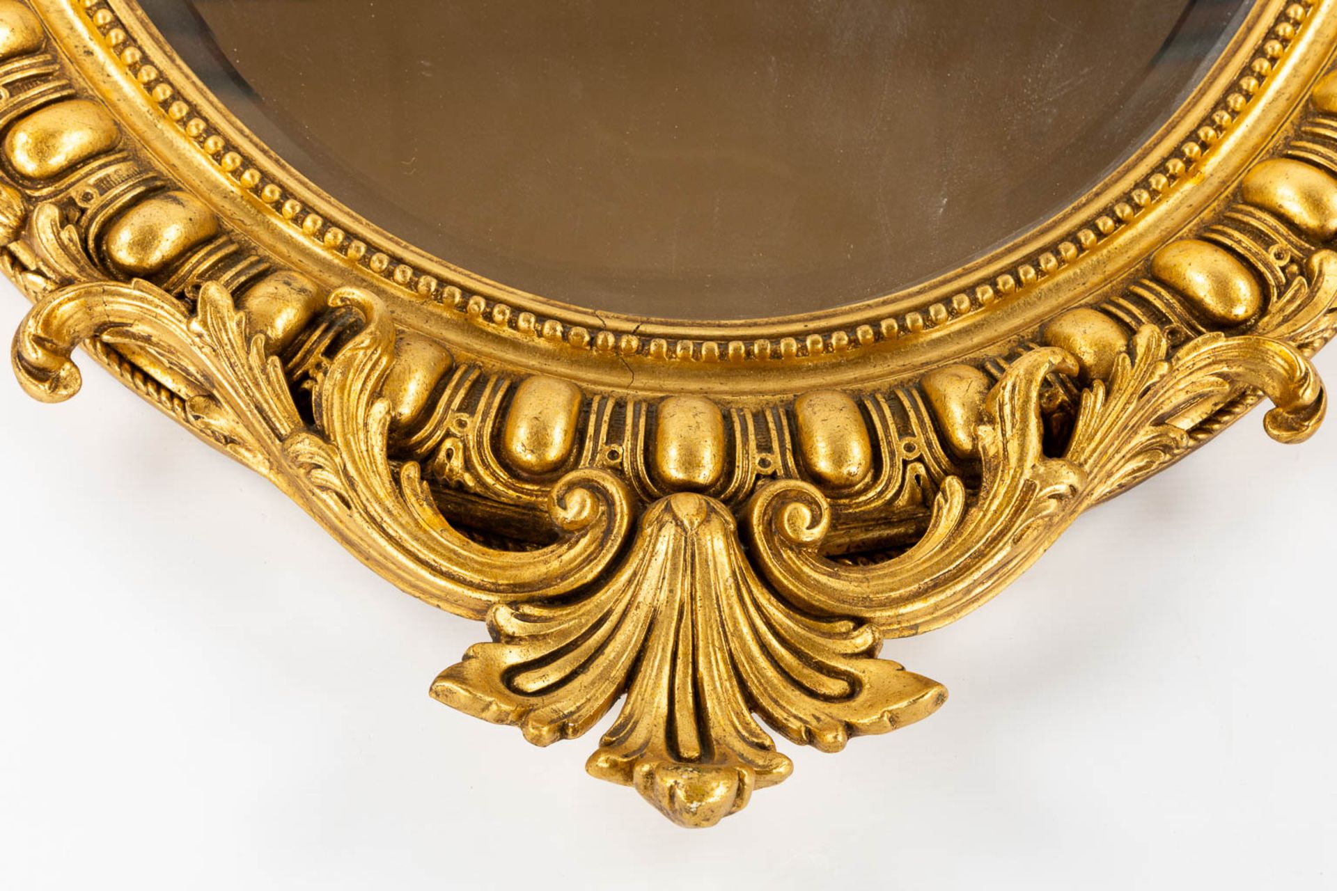 An antique mirror, gilt in a Louis XV style. 19th C. (W:89 x H:126 cm) - Image 4 of 8