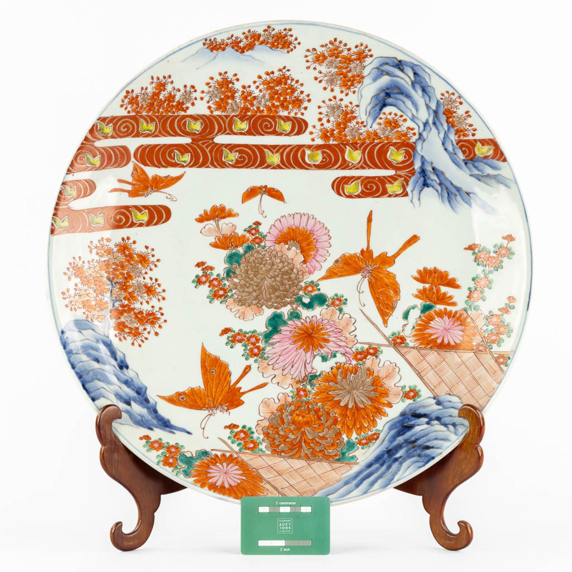 A large Japanese Imari bowl, decorated with butterflies and flowers. 19th C. (D:47 cm) - Image 2 of 11
