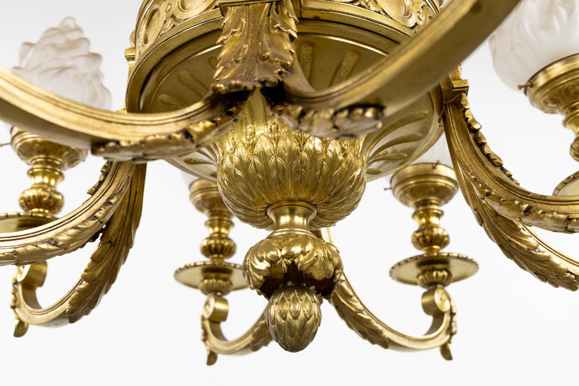 A chandelier, bronze in a Louis XVI style. Gilt bronze. (H:100 x D:72 cm) - Image 9 of 9