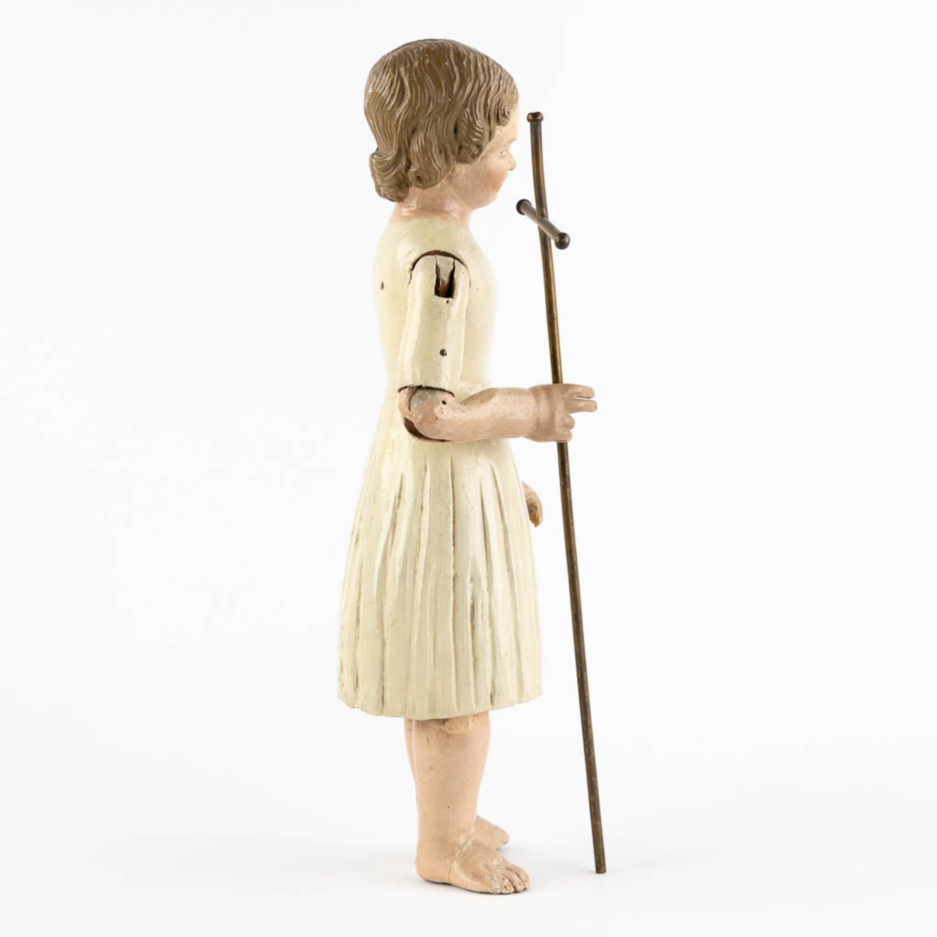 An antique patinated and wood-sculptured doll. 19th C. (L:11,5 x W:17 x H:45 cm) - Image 7 of 12