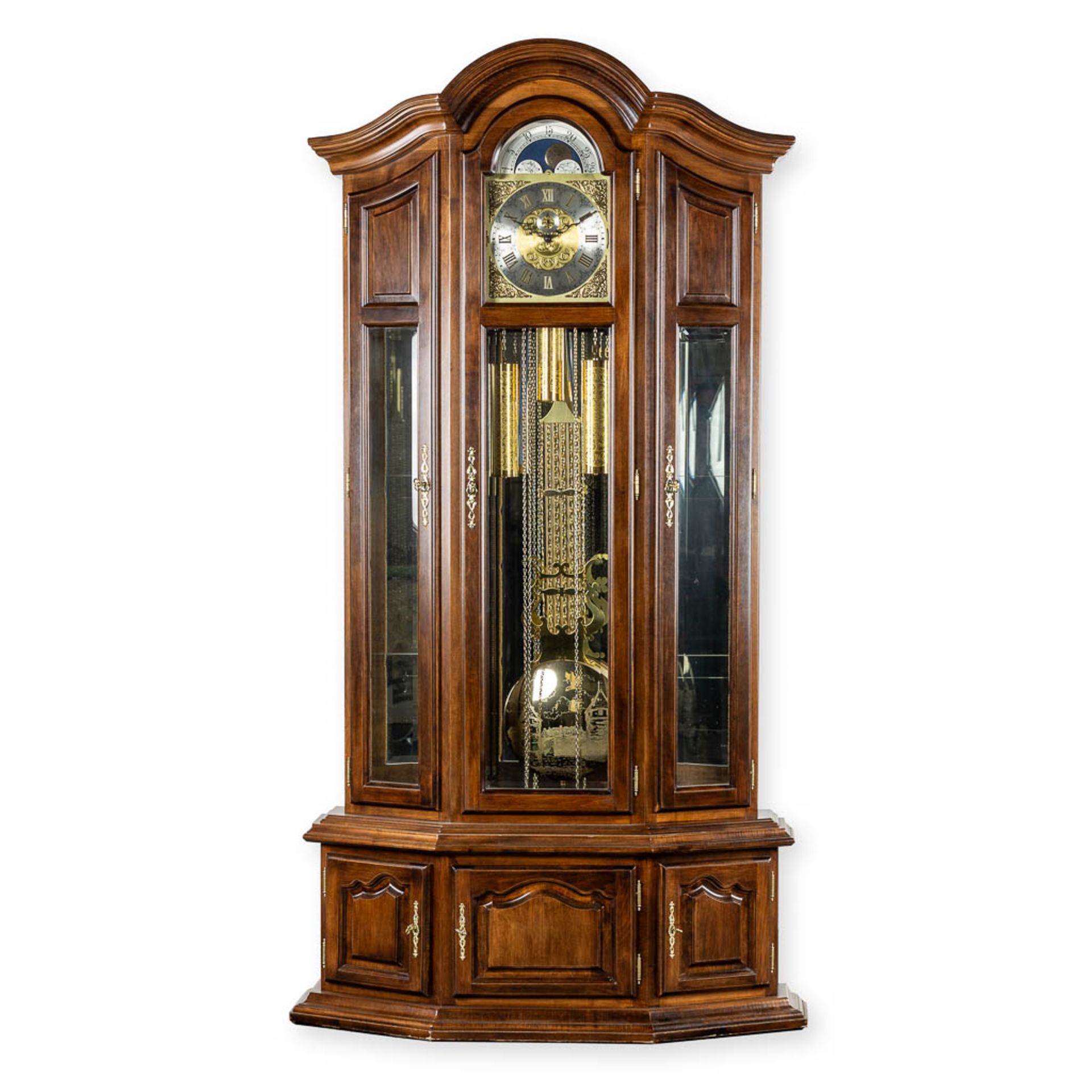 A decorative standing clock, with decorated weights. (L:40 x W:106 x H:214 cm)