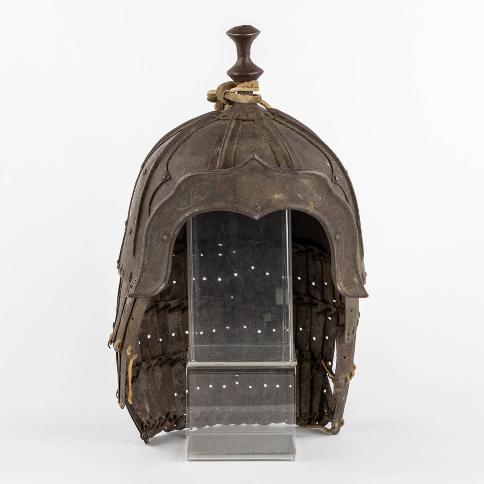 A Tibetan military helmet, iron and leather. 18th/19th C. (L:20 x W:24 x H:42 cm) - Image 3 of 11