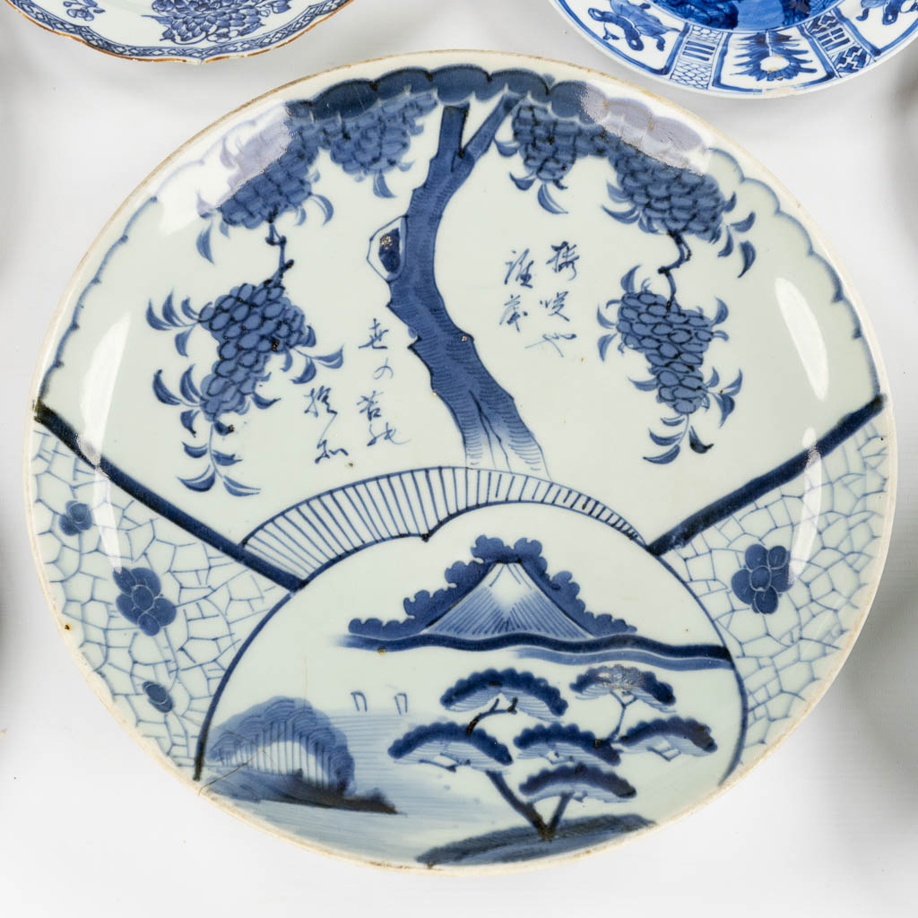 Eleven plates, Blue-White and Famille Rose, 18th and 19th C. (D:36,5 cm) - Image 4 of 9