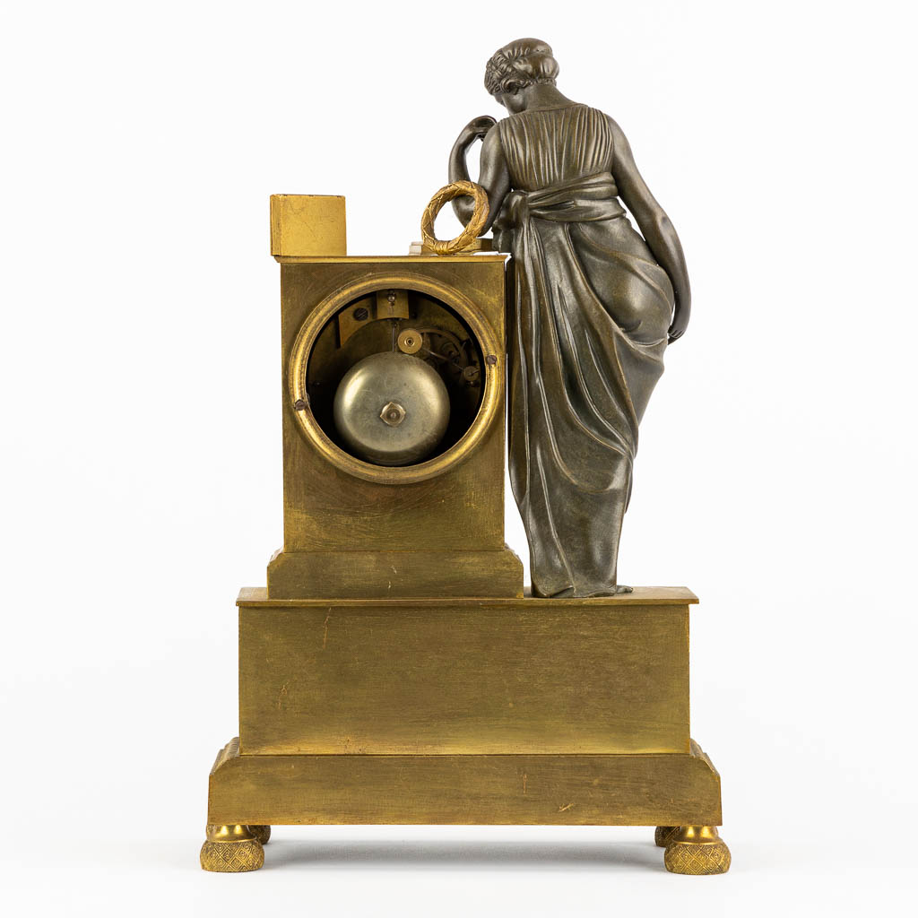 A mantle clock, gilt bronze, Empire. Circa 1800. (L:11,5 x W:26 x H:39,5 cm) - Image 5 of 10