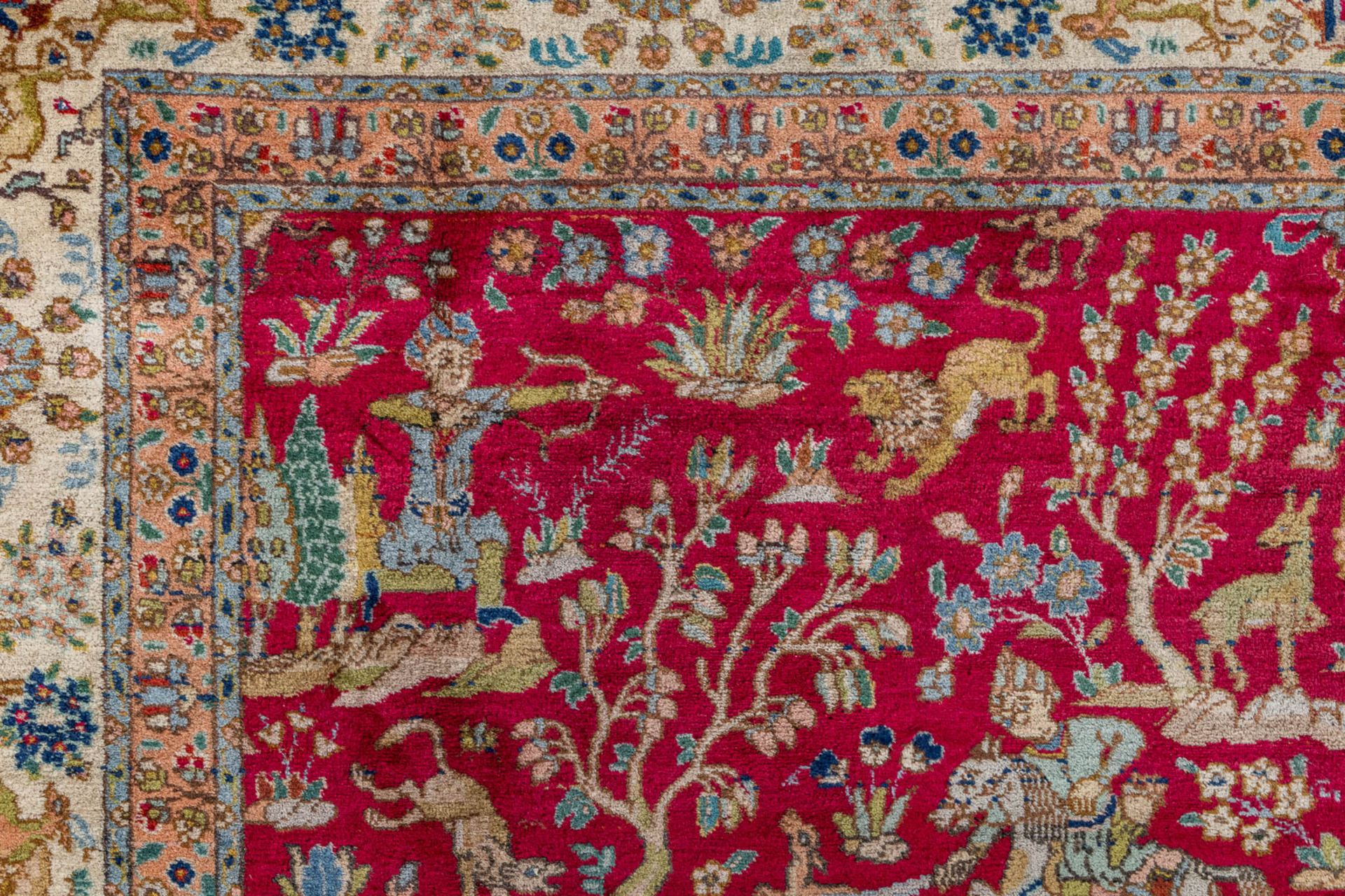 A large Oriental hand made carpet, hunting scènes, Tabriz. (L:329 x W:252 cm) - Image 11 of 16